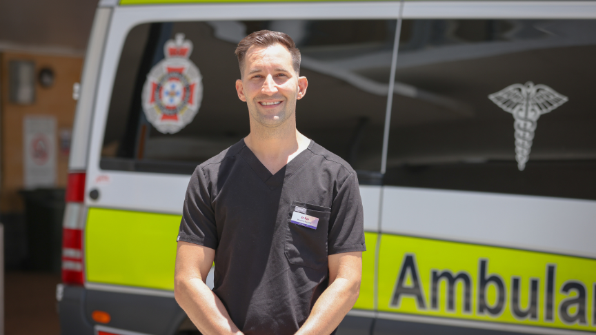 Dr Bob Polanski standing in front of an ambulance outside Toowoomba Hospital