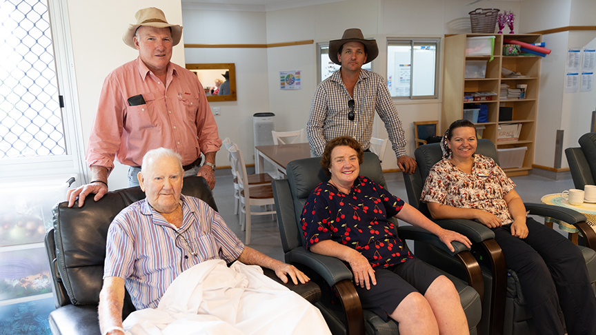 Photo of people at Jandowae hospital sitting on donated chairs