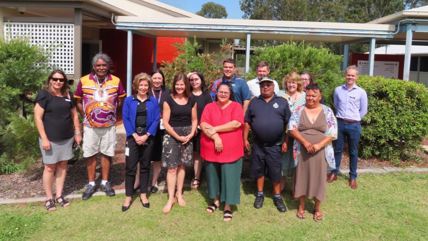 Cherbourg Health Council group of members standing in front of TAFE Queensland Nurunderi Campus