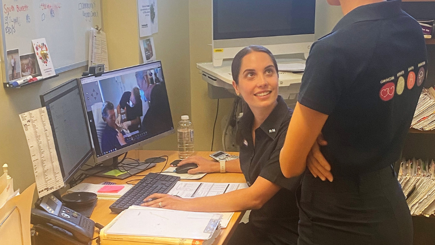 Toowoomba-based nurses Georgia Parker and Naomi Kinast facilitating the first Kingaroy Teleoncology patient session over the computer