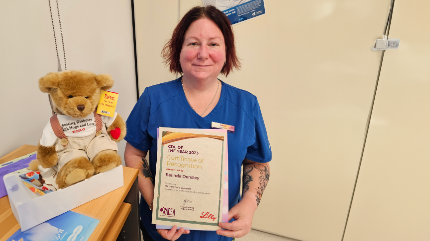 Diabetes Educator Belinda Densley holding her certificate