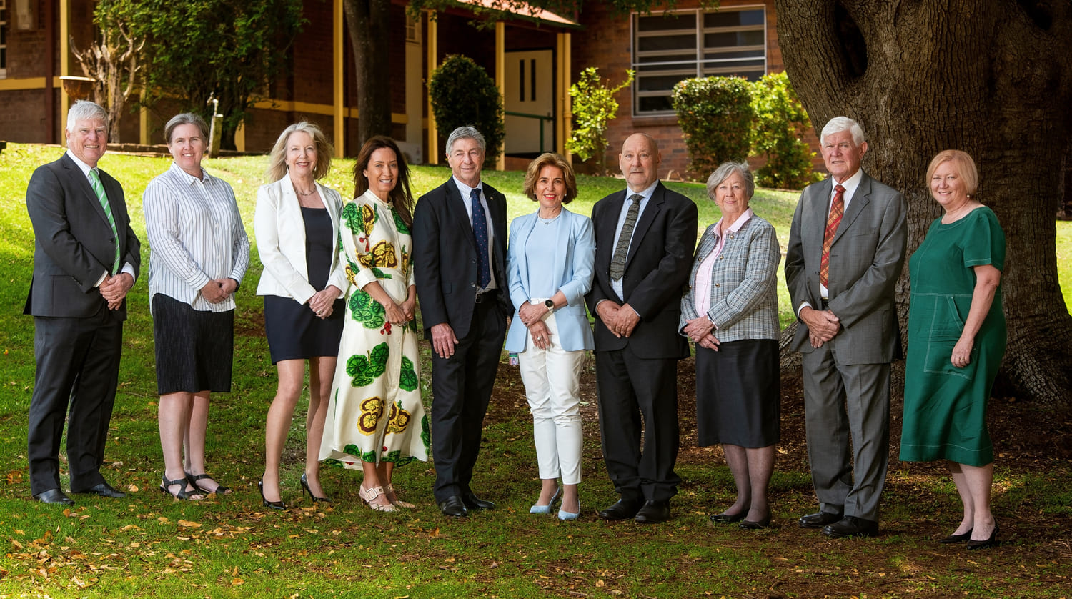 Darling Downs Health Board Members and Chief Executive posing for a photograph together outside