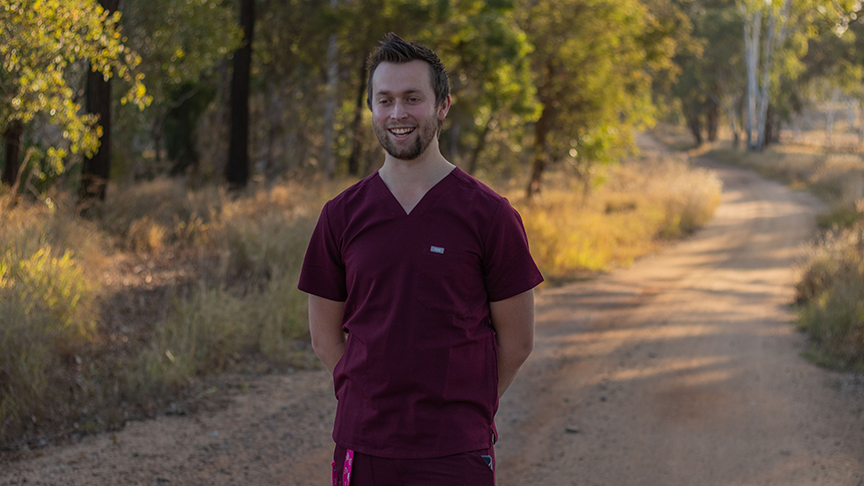 Future registered nurse Jack Christoffel standing outside