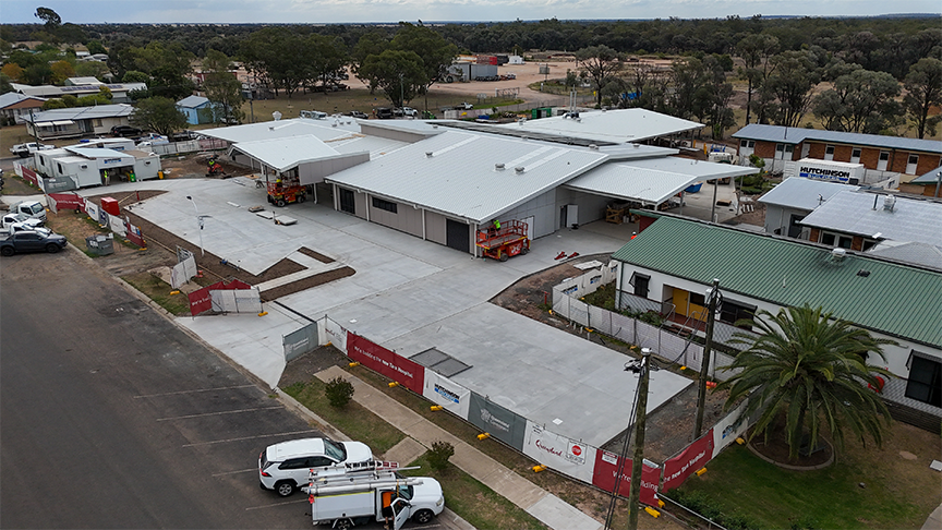 Aerial view of the New Tara Hospital at final stages of construction. Construction fencing around the perimeter of the area.